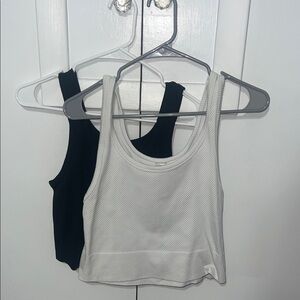 One Step Up Black and White Tank Tops